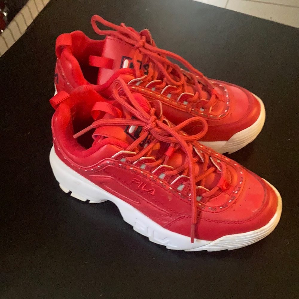 Red Fila tennis shoes